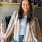 Some cardigans are functional. This one is a whole look. The&nbsp;Denim &amp; Mocha Accent Cardigan wraps you in soft, cozy knit while a bold colorblock stripe in denim blue, warm mocha, and cream does all the talking. The kind of layer you reach for on repeat — whether you're running errands in style or curling up with coffee.

Why You'll Love It

Vertical colorblock stripe in mocha, cream &amp; dusty blue — effortlessly editorial
Relaxed, boxy fit with a cropped hip-length hem — flattering on every frame
