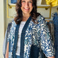 Creations

Merge artistic indigo florals with rugged denim accents for a standout, high-impact layer. This breezy kimono-style cardigan features functional pockets and a relaxed silhouette, perfect for effortless day-to-night styling.

Chic denim trim adds modern edge.
Bold floral print for artistic flair.
Breezy fabric ensures all-day comfort.
Functional pockets for daily essentials.
Relaxed fit flatters every silhouette.
Versatile layering for any season.

