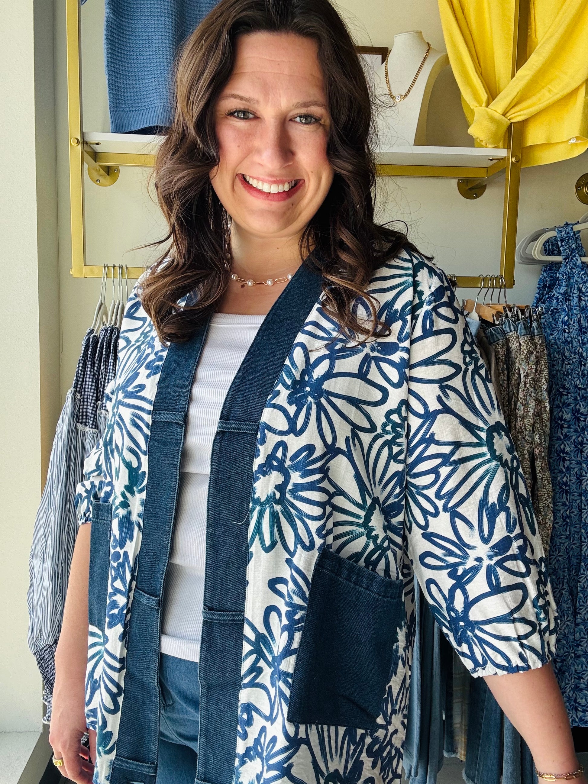 Creations

Merge artistic indigo florals with rugged denim accents for a standout, high-impact layer. This breezy kimono-style cardigan features functional pockets and a relaxed silhouette, perfect for effortless day-to-night styling.

Chic denim trim adds modern edge.
Bold floral print for artistic flair.
Breezy fabric ensures all-day comfort.
Functional pockets for daily essentials.
Relaxed fit flatters every silhouette.
Versatile layering for any season.
