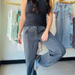 Dress them up or keep it casual — the Indigo Satin Elastic Joggers by Doe &amp; Rae do both effortlessly. The rich indigo satin fabric gives these joggers an elevated, luxe feel that goes way beyond your average loungewear.

An elastic waistband ensures an easy, comfortable fit, while the sleek satin finish makes them just as at home with heels and a blouse as they are with sneakers and a tee. A versatile wardrobe staple you’ll wear on repeat.

Satin jogger with elastic waistband
100% Polyester — smooth, li