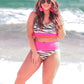 Spend your summer strutting on the wild side with this fun two piece swimsuit featuring stretchy material patterned with a black and white zebra print with neon bands, adjustable spaghetti straps, and removable padding!