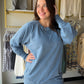 Soft, slouchy, and seriously cozy. The Dusty Blue Pigment Dyed Pullover by Zenana is your new favorite weekend essential. Made from 100% cotton French terry, it has that perfectly worn-in feel with a pigment dye finish that gives it a subtle, vintage-inspired depth of color unique to each piece.

Ribbed detailing adds a polished touch, and the handy pockets make it as practical as it is stylish. Whether you're running errands or lounging at home, this relaxed pullover does it all in effortless dusty blue.
