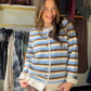 A little color, a lot of outfit potential

Meet the Brown &amp; Blue Striped Button Cardi by Easel. The brown-and-blue stripes bring a playful twist to a classic button-front layer, making it an easy piece to reach for when your outfit needs a little something extra.

Why you'll love it

Brown and blue stripes add color without being hard to style.
Button-front cardigan styling lets you wear it open or buttoned up.
Available in Small, Medium, and Large.
Style it your way

Picture it over your favorite tee w