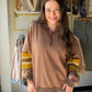 Your new favorite weekend pull. The&nbsp;Mocha Accent Sleeve Half Zip by Easel is a washed terry pullover that hits the sweet spot between cozy and cool — mineral-washed fabric with a soft, lived-in feel, a mock collared neckline, and striped ribbed sleeve panel detail in mocha that makes it feel anything but basic. Relaxed, oversized, and endlessly layerable.

Why You'll Love It

Mineral washed terry fabric — soft, broken-in feel from the first wear
Mocha striped ribbed sleeve panel 