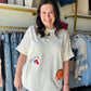 Easel

Brighten your everyday style with this playful, oversized terry knit top featuring charming fruit embroidery patches. Designed with a relaxed silhouette and breathable half-sleeves, it’s the ultimate blend of cozy comfort and whimsical personality.

Breathable terry knit for all-day comfort.
Relaxed, oversized fit flatters every body.
Charming handcrafted fruit patch detailing.
Versatile half-sleeves for effortless layering.
Timeless crew neck for classic styling.
Ultra-soft fabric feels like a dream