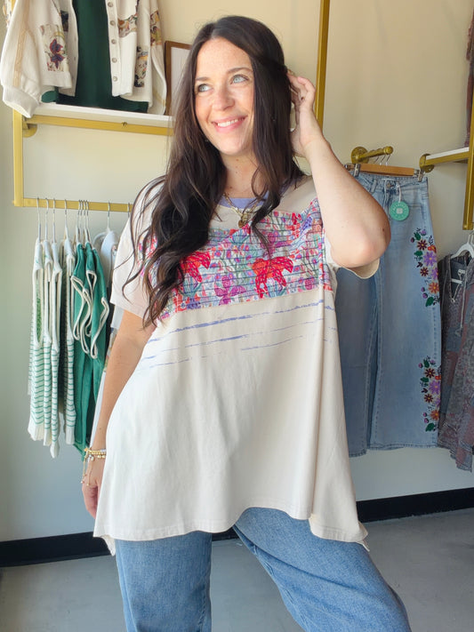 Your new go-to tee, elevated. The Ecru Accent Band Flowy Tee by Easel is effortlessly cool with its relaxed, flowy silhouette and subtle accent band detail that sets it apart from your basic tee. The soft ecru tone makes it endlessly easy to style — tuck it into jeans, layer it under a jacket, or wear it loose for that perfectly undone look.

Made from 100% cotton, it’s breathable, soft, and gets better with every wash. Runs oversized, so you get that easy, relaxed fit without sacrificing style.

Flowy knit