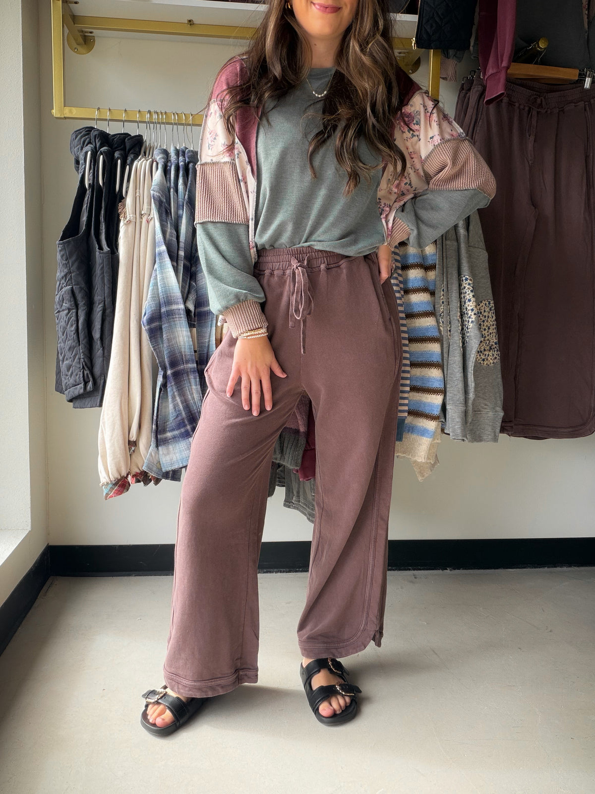 Easy days deserve pants with a little character. The Mocha Mineral Wash Knit Pants by Easel pair a washed terry look with a wide-leg, cropped-ankle silhouette. Pull them on with a simple tee for a relaxed afternoon, or add a coordinating knit when you want an outfit that feels put together without trying too hard.

Details to love

Mineral-washed mocha finish in 100% cotton terry knit.
Wide leg with cropped ankle length.
Elastic waistband with drawstring.
Front side pockets and side-panel seam detail.
Size 