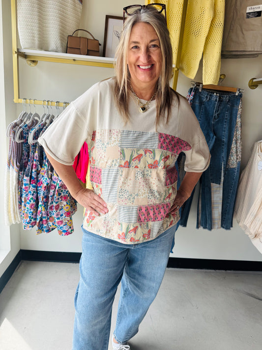 Description: PRINT PATCHWORK WASHED TERRY TOP
-ROUNDED NECKLINE
-MINERAL WASHED
-RELAXED, BOXY FIT
-MIXED FLORAL AND STRIPE PRINTS
-ROLLED UP SLEEVES
-DROPPED SHOULDER
-SMALL MEASUREMENTS : LENGTH - 26.75" &amp; BUST - 23"