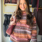 Warm peach meets earthy brown in a sweater that makes getting dressed feel easy. The Peach &amp; Brown Accent Sweater by Easel has a mock neckline that gives simple denim-and-boots days a polished little lift. Reach for it when you want your knitwear to carry the outfit.

What makes it special

Peach and brown accent color pairing.
Mock neckline, as listed in the existing product details.
By Easel.
Style it your way

Wear with dark denim to let the colors stand out, or pair with neutral trousers for a softe