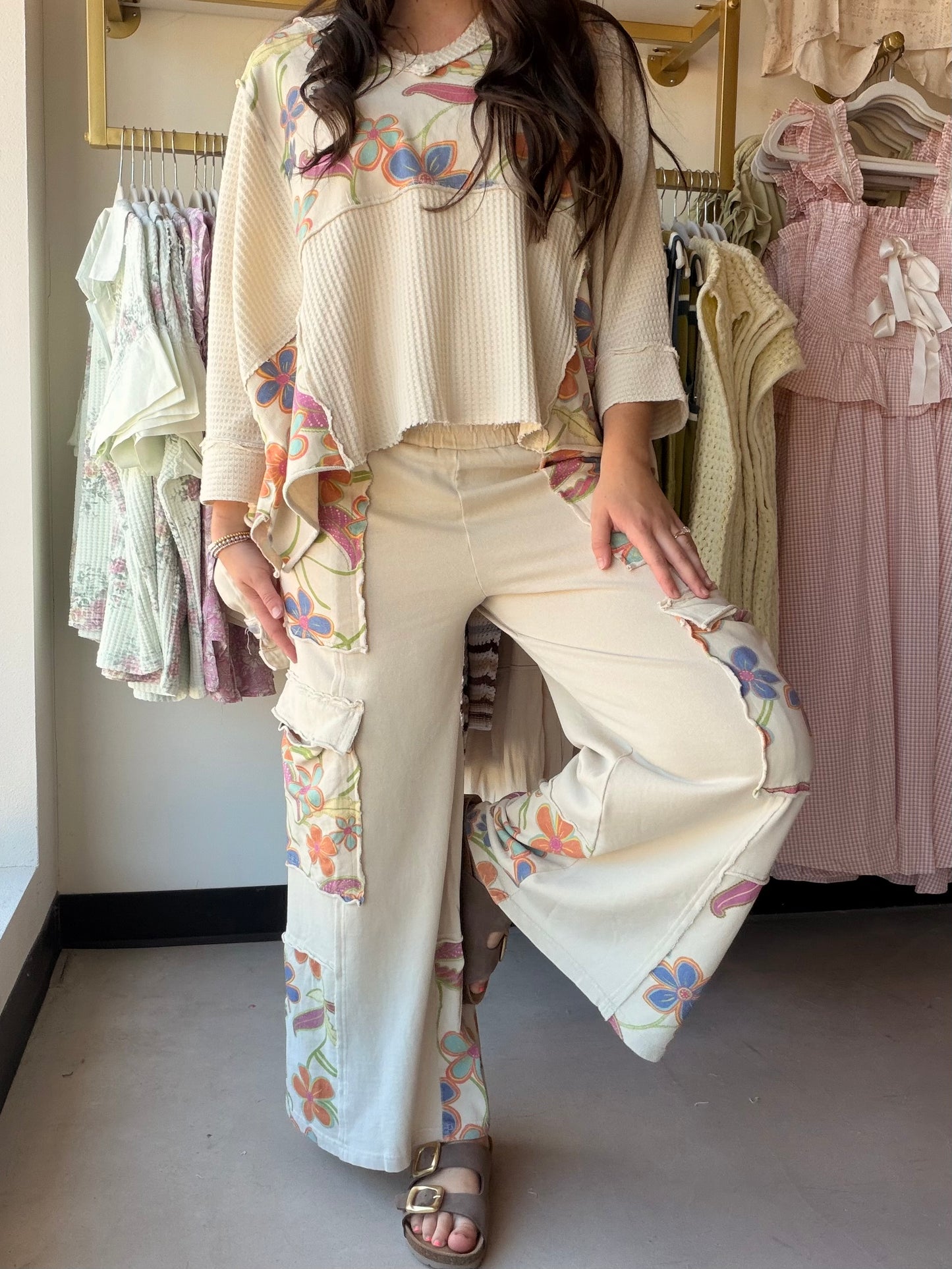 Floral Mix Terry Wash Pants

Meet your new favorite loungewear obsession. These relaxed wide-leg pants are crafted from soft, washed terry knit fabric in an all-over floral print — the kind of effortless piece you'll reach for again and again, whether you're running errands or unwinding at home.

Relaxed wide-leg silhouette
All-over floral print in washed terry fabric
Elastic waistband with adjustable drawstring
Side pockets + cargo-style detailing
100% Cotton knit — soft, breathable, and easy to wear
Part 