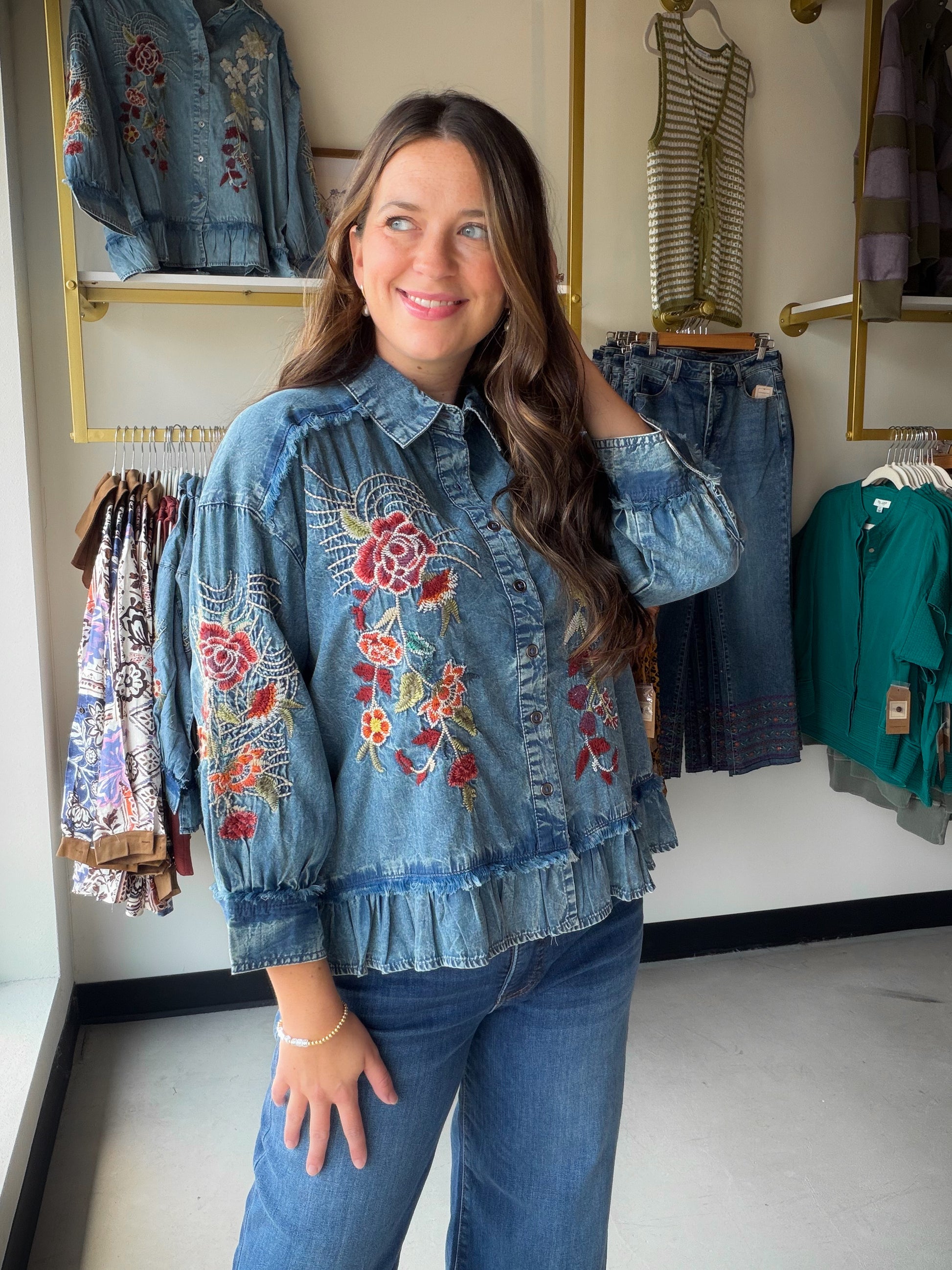 The&nbsp;Embroidered Chambray Peplum Top is the kind of piece that makes getting dressed feel special. Delicate embroidered detail and a flattering peplum hem create a silhouette that's both feminine and refined — dressed up or down with ease.

Made from a 64% Cotton, 36% Lyocell blend, the soft chambray fabric drapes beautifully and breathes well, making it as comfortable as it is chic. Whether you're heading to brunch, the office, or a weekend outing, this top delivers effortless style every time.

Intric