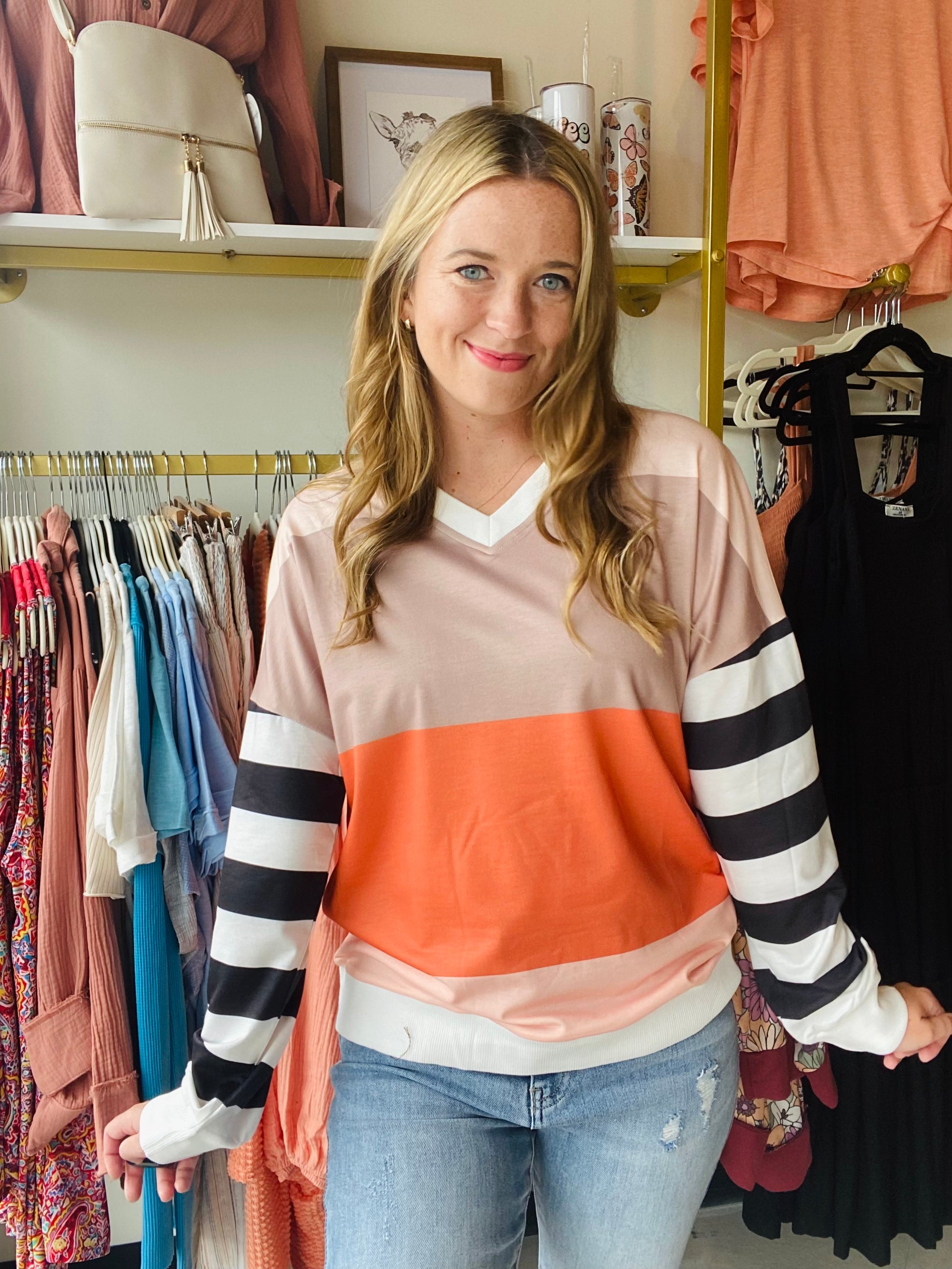 Our lovely Orange Striped Sleeve V Neck is crafted with you in mind. This ultra-soft and comfortable top is the perfect blend of fashion and function. With a V neckline, lightweight and breathable fabric, and colors of fall - you’ll love this stylish colorblock and striped design.