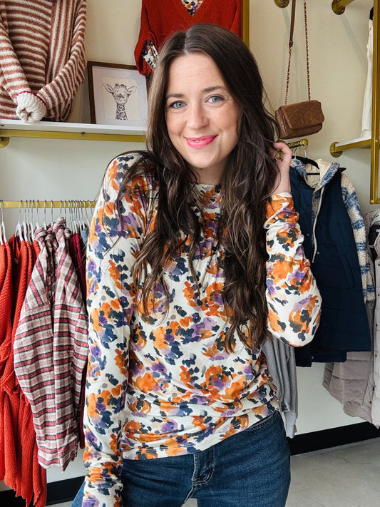 Michelle Mae

Effortlessly blend style and comfort with this new long sleeve top. Designed with stretchy fabric, a fitted silhouette, added thumbholes and it features a high neck line for a chic touch. You can also tuck it in for a faux bodysuit look.&nbsp;
