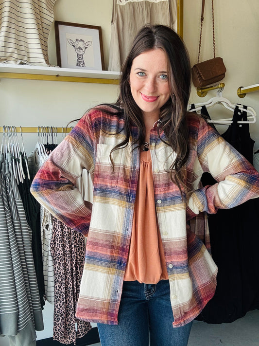 This easy, versatile button up is perfect as a layer or worn by itself. Featuring an oversized fit, shirt tail hem and dual patch pockets.

Collared neckline
Button front closure
Shirt tail hem