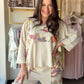 Floral Mix Waffle V Neck Top

The perfect top to complete your lounge set. This relaxed, oversized waffle knit top features a wide V neckline, contrast floral print panels, and a mineral-washed finish that gives it that effortlessly lived-in look. Wear it with the matching pants or style it on its own — either way, it's a vibe.

Relaxed, oversized fit
Wide V neckline
Contrast floral print panels
Textured waffle knit with mineral wash
3/4 sleeves with side mini slit
53% Cotton, 42% Polyester, 5% Spandex
Part
