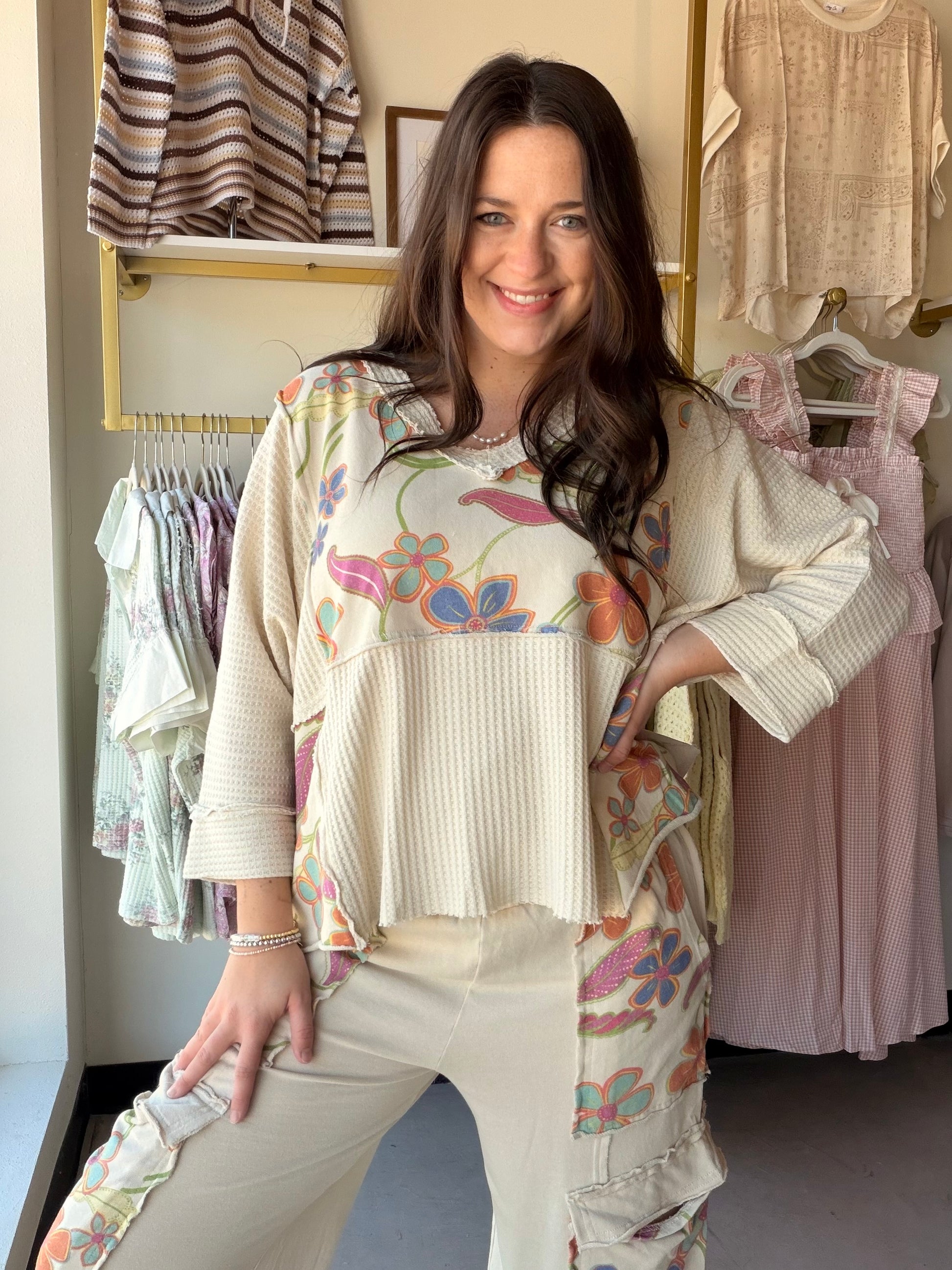Floral Mix Waffle V Neck Top

The perfect top to complete your lounge set. This relaxed, oversized waffle knit top features a wide V neckline, contrast floral print panels, and a mineral-washed finish that gives it that effortlessly lived-in look. Wear it with the matching pants or style it on its own — either way, it's a vibe.

Relaxed, oversized fit
Wide V neckline
Contrast floral print panels
Textured waffle knit with mineral wash
3/4 sleeves with side mini slit
53% Cotton, 42% Polyester, 5% Spandex
Part