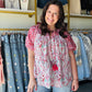 Oli &amp; Hali

Radiate effortless boho charm in this vibrant Oli &amp; Hali mixed-print blouse featuring romantic puff sleeves and playful tassel details. Crafted from a breathable, lightweight blend, its flattering relaxed fit ensures you stay cool and stylish from brunch to sunset.

Flattering relaxed fit for effortless style.
Dramatic puff sleeves add romantic flair.
Vibrant strawberry floral mixed-print design.
Playful tassel ties and button front.
Breathable rayon blend for all-day comfort.
Authentic 