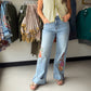 Tru Luxe Jeans

Floral embroidery and a foldover cuff give this wide leg jean a romantic, one-of-a-kind detail. Made from a soft stretch blend, it can be worn rolled for a cropped look or released for a longer leg line, offering two fits in one.

Wide leg jean with embroidery and foldover cuff
Floral embroidered detail
Foldover cuff, wear rolled or released
Light indigo wash
Cotton/poly/rayon/spandex stretch fabric
Romantic, elevated denim style
