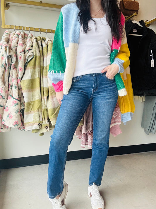 Flying Monkey

These Mid Rise Ankle Slim Straight Jeans are made from comfortable stretch denim, feature a mid rise waist, and have 5 pockets for practicality. With a lightly distressed detail and an ankle length, these jeans come in a dark wash and a slim straight fit. Measurements include a front rise of 9", an inseam of 28", and a leg opening of 14".