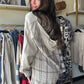 Cozy up in this playful Plaid Washed Cotton Hoodie, designed for effortless style and comfort. Featuring a soft, textured gauze fabric with a contrasting plaid pattern, it offers a relaxed fit with dropped shoulders and buttoned cuffs. The attached drawstring hood and front chest pocket add practical charm, while the button-down pullover design lets you mix and match with ease. Perfect for layering or wearing solo, this hoodie brings a fun, casual vibe to your everyday look.