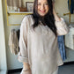 Breathable double gauze fabric brings comfort and style to this natural floral woven top. The 3/4 sleeves feature convenient roll-tab closures, allowing you to adjust the fit throughout the day. Its lightweight, airy construction makes it an excellent choice for layering or wearing on its own during warm weather. The subtle botanical print complements any casual wardrobe, whether you're heading to brunch, the office, or weekend adventures. Versatile, comfortable, and effortlessly chic.