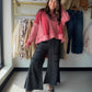 The Black Fringe Wide Leg Pants by Given Kale bring movement and personality to a timeless black silhouette. The dramatic wide leg creates an effortlessly elevated look, while fringe detailing adds a playful finish that stands out with every step.

Style them with a fitted top and heels for a night out, or pair them with a simple sweater and boots for a bold boutique look. These are the pants to reach for when basic black just will not do.

Details

Classic black color
Statement fringe detailing
Wide-leg si