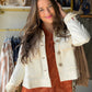 Clean, crisp, and completely versatile. The&nbsp;Ivory Cropped Button Front Jacket by Given Kale is the kind of layering piece that goes with everything — a tailored cropped silhouette in fresh ivory with a classic button-front closure that looks sharp over a dress, a tee, or your favorite denim. Soft stretch fabric that moves with you and holds its structure all day.

Why You'll Love It

Crisp ivory colorway — a clean, timeless neutral that pairs with any palette
Cropped silhouette — flattering, modern, an