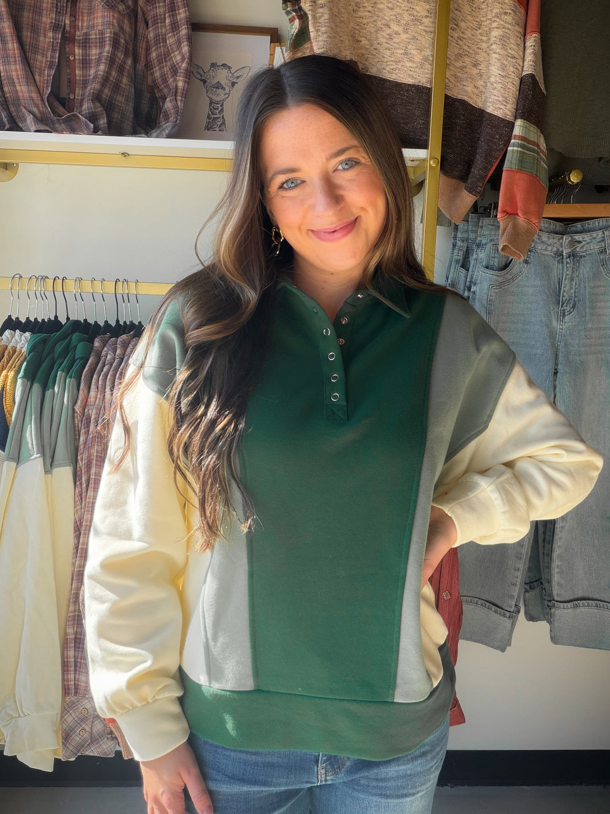 Your Casual-Day Lineup Just Got Cuter

The Hunter Collared Snap Sweatshirt by Staccato brings a little extra polish to your laid-back days. A collared neckline and half-snap front give this sweatshirt a sporty touch, while color-block detailing adds interest without making your outfit complicated. Brushed French sweatshirt fabric makes it an inviting choice for coffee runs, casual lunches, and winding down after a busy day.

Style It Your Way

Imagine a slow Saturday morning: your favorite denim, easy sneak