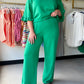 The pants that feel as good as they look. The Green Luxeknit Wide Leg Pants by Umgee are crafted from a buttery-soft LuxeKnit fabric with just the right amount of stretch — giving you a structured, polished silhouette without sacrificing an ounce of comfort.

The wide leg sweep and elastic drawstring waistband make these an easy yes for everything from a casual day at home to a dressed-up evening out. Style them with a fitted top and sandals or a flowy blouse and mules for an effortlessly chic look.

Elasti