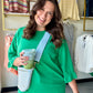 Feminine details meet everyday comfort. The Green Luxeknit Ruffle Sleeve Top by Umgee features a pretty ruffle tier raglan sleeve and a round neckline in a soft, stretchy LuxeKnit fabric that moves with you all day long.

The structured yet lightweight silhouette makes it easy to dress up or down — pair it with the matching Luxeknit Wide Leg Pants for a coordinated set, or style it with denim for a more casual look.

Round neckline
Ruffle tier raglan sleeves
Soft hand feel with good stretch
Not lined
47% Ra