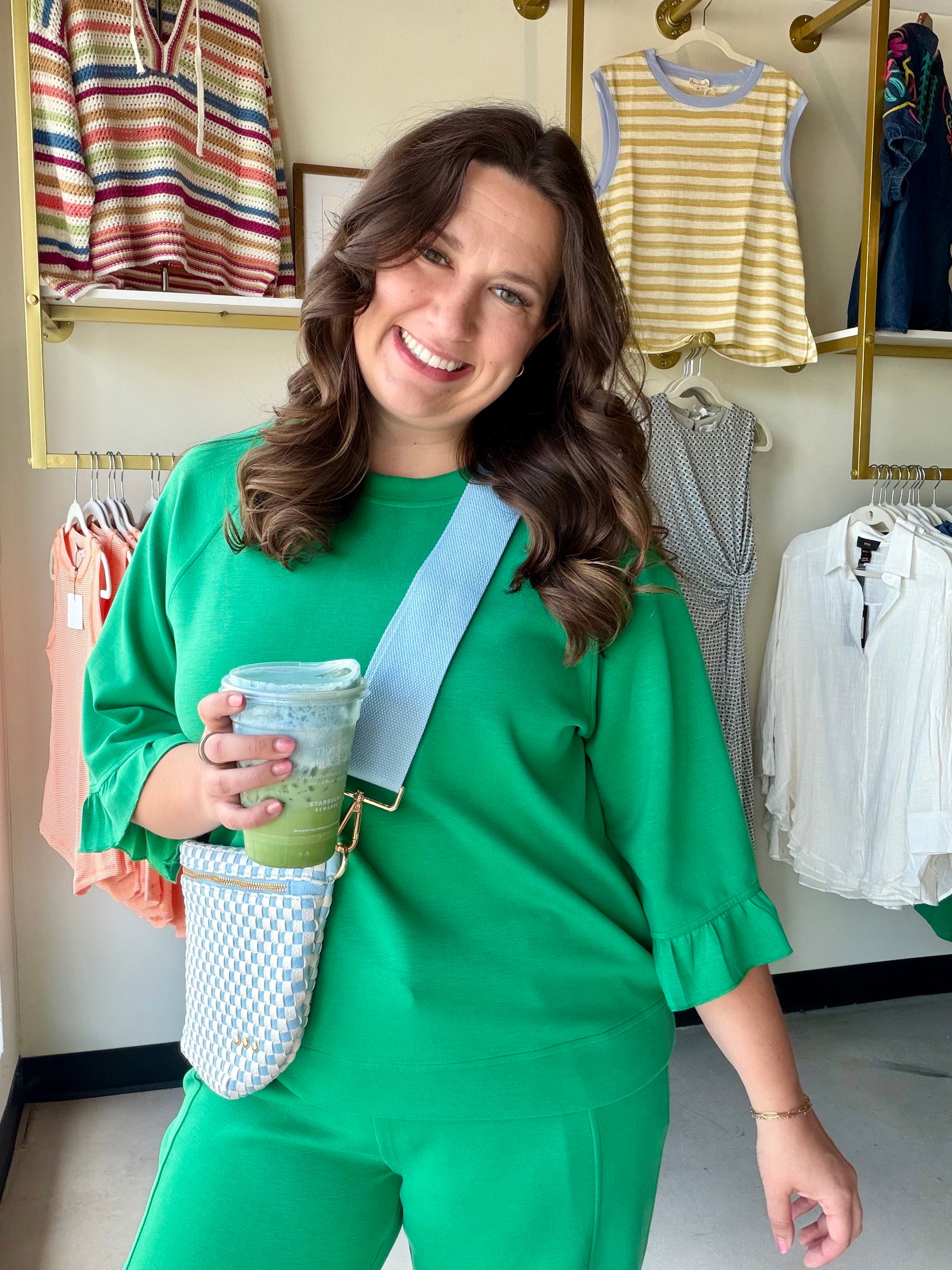 Feminine details meet everyday comfort. The Green Luxeknit Ruffle Sleeve Top by Umgee features a pretty ruffle tier raglan sleeve and a round neckline in a soft, stretchy LuxeKnit fabric that moves with you all day long.

The structured yet lightweight silhouette makes it easy to dress up or down — pair it with the matching Luxeknit Wide Leg Pants for a coordinated set, or style it with denim for a more casual look.

Round neckline
Ruffle tier raglan sleeves
Soft hand feel with good stretch
Not lined
47% Ra