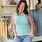 Staccato

Refresh your summer wardrobe with this chic, breathable knit tank. Featuring vibrant green stripes and a playful pink scalloped trim, it offers the perfect blend of preppy and modern style. This versatile Staccato essential pairs effortlessly with your favorite denim or skirts.

Playful pink scalloped edge trim.
Soft, breathable lightweight knit fabric.
Classic vibrant green and white stripes.
Flattering sleeveless crew neck silhouette.
Versatile for layering or solo wear.
Durable, high-quality St