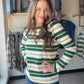 Stripes get a refresh. This multi-striped French terry top from Staccato pairs a rich green and gold palette with a relaxed crew neck silhouette and side slits for a little extra ease and movement. It's the kind of top that looks intentional with minimal effort — throw it on with your favorite jeans and go.

Crew neck, long sleeve silhouette — classic and versatile
Multi-stripe pattern in green &amp; gold for a bold, polished look
Side slits for added movement and a flattering drape
French terry fabric — so