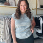 Staccato

Elevate your daily rotation with this Staccato top featuring delicate white floral patterns and elegant pico stitch trim. Crafted from ultra-breathable cotton with a flattering split neckline, it offers a sophisticated silhouette that transitions seamlessly from casual errands to polished afternoons.

Flattering split neckline silhouette.
Intricate, refined pico stitch detailing.
Soft, breathable premium cotton fabric.
Charming contrast white floral print.
Versatile and stylish cap sleeves.
Effort
