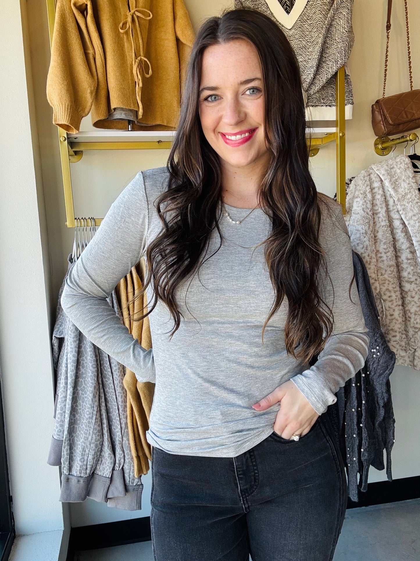 Yelete&nbsp;

Cozy meets cute in this Heather Grey Viscose Long Sleeve tee. Its soft, breathable fabric keeps you comfy all day, while the classic crew neckline adds just the right touch of charm. The fitted silhouette hugs your shape for a flattering look, and those long sleeves are perfect for chillier days or layering fun.&nbsp;