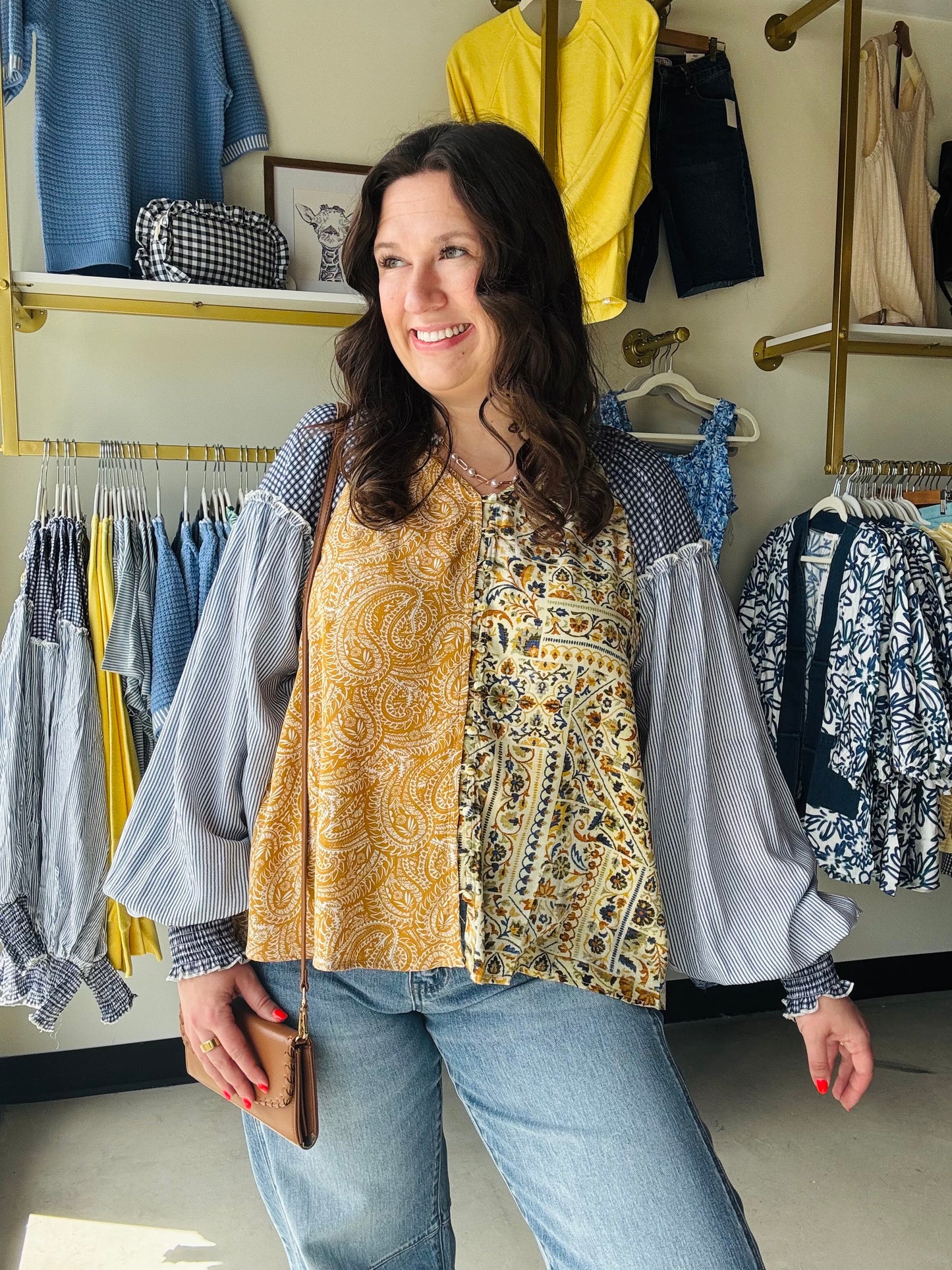 Oli &amp; Hali

This Oli &amp; Hali mixed print blouse combines artisan mineral wash details with a vibrant honey and blue boho aesthetic. Crafted from a breathable rayon-viscose blend, its relaxed silhouette delivers effortless style and premium all-day comfort

Unique artisan mineral wash finish
Breezy, effortless relaxed fit
Stunning mixed boho print pattern
Lightweight, breathable viscose-rayon blend
Flattering fit, true to size
Statement voluminous balloon sleeves
Versatile day-to-night styling

