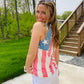 This Miss Americana Flag Tank Top is perfect for your summer patriotic wardrobe. The high neckline, festive American flag design, and patriotic colors make it ideal for 4th of July and Memorial Day celebrations. Wear it dressed up with a denim skirt or down with black athletic shorts for any summer occasion.