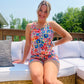 Stay stylish and comfortable all summer in the Vibrant Garden Floral Lounge Set. This set features a scoop neck tank top and drawstring comfy shorts in bright colors - perfect for lounging around going out and about.. Shhh we won't tell!  The lightweight fabric keeps you cool in the heat, while the stylish design ensures you look great even at home! 