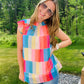 This Color Wheel Ruffle Blouse is the perfect office essential for the summer season. Crafted with bright, vibrant colors, the trendy high neckline and key hole closure provide an updated classic silhouette. The perfect match for any summer ensemble.