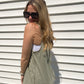 This Olive Exposed Seam Tank Top is the perfect pick for a stylish-yet-casual look. Featuring multi-seam detailing, raw edge neck and hem finishing, and side front pockets, this tank top will be your go-to for effortless, everyday style. The round neck ensures a classic look.  Branded: Very J 