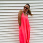 This Cami Maxi Dress is crafted from a blend of 57% polyester, 38% rayon and 5% spandex. Its side pockets, adjustable spaghetti straps and flowy fit provide a comfortable, stylish look. Model Sophie is 5'4" and wearing a size small.  This is the ultimate "Airplane outfit" or "Sunburn outfit" of you know what I mean! 