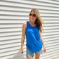 The Tiffany Tank is the perfect combination of comfy and trendy. Crafted with a stretchy fabric for ultimate comfort, this tank features a scoop neck and wide straps to ensure a secure fit and bold neon colors to make a statement. Feel fashionable and secure with this essential tank.
