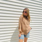 This Frayed Hem Woven Top is perfect for the fashion-forward individual. This long-sleeved woven top features a frayed hem detail, button down closure, and a front pocket patched for a stylish, yet comfortable look. With its modern design and subtle colors, this top is sure to be a timeless addition to your wardrobe.
