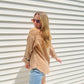 This Frayed Hem Woven Top is perfect for the fashion-forward individual. This long-sleeved woven top features a frayed hem detail, button down closure, and a front pocket patched for a stylish, yet comfortable look. With its modern design and subtle colors, this top is sure to be a timeless addition to your wardrobe.