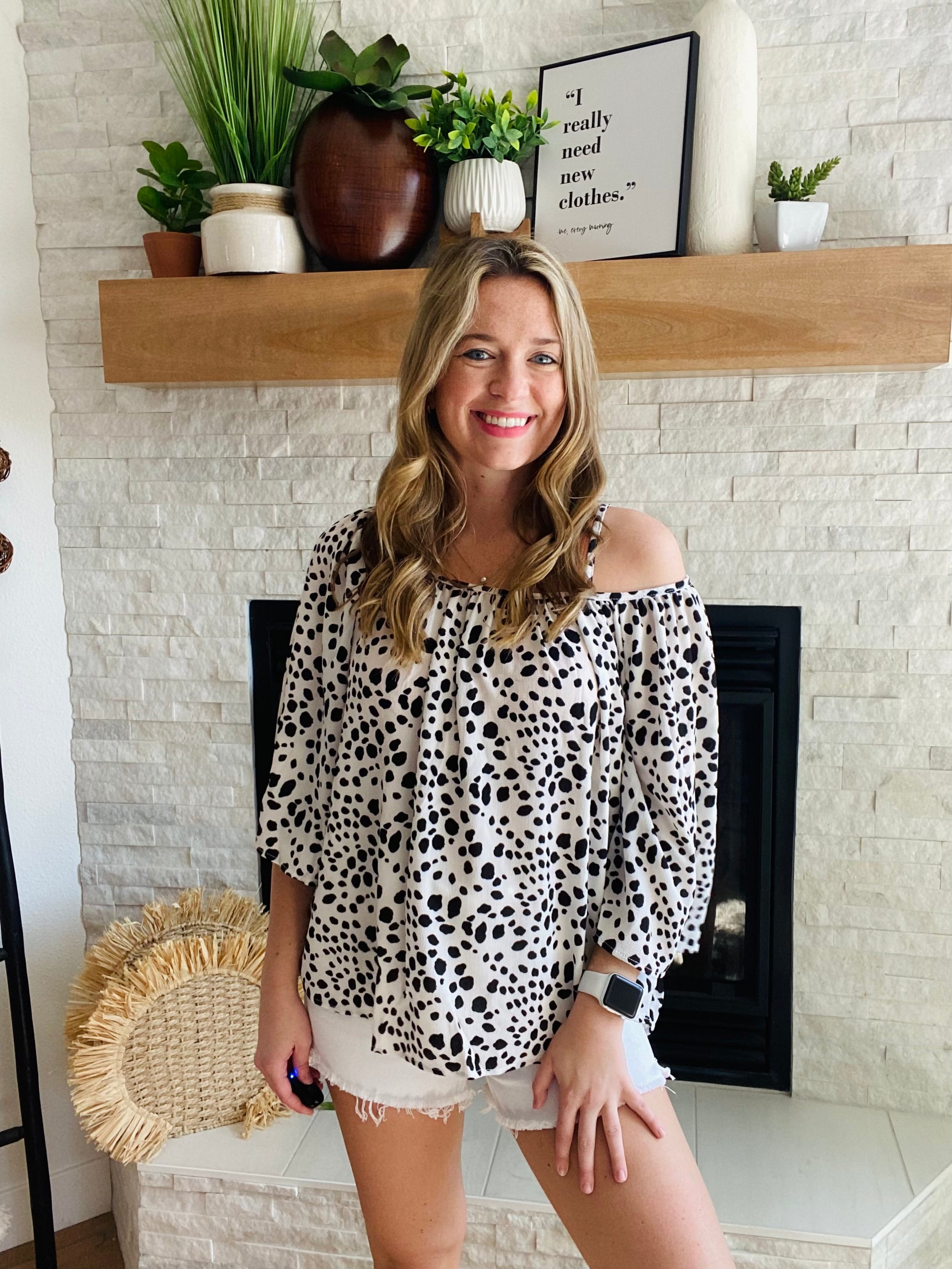 This gorgeous top is a perfect piece for your closet! You are sure to fall in love with this beauty! This top features a rounded neckline, cold shoulders, & a flowy style. You can throw on the adorable top with a pair of jeans or shorts and you're to go!