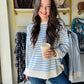 Stay cozy in the Cloud Ivory Stripe Sweater, featuring a playful crewneck and airy wide sleeves that add just the right touch of flair. Its lightweight knit keeps things breezy and comfortable, perfect for layering on cooler days. Enjoy a fun twist on a classic striped look!

Wishlist&nbsp;