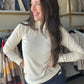 Style Description:

Made to be worn everywhere, this sleek long sleeve is featured in a formfitting silhouette and seamless so-soft fabrication with a chic mock neckline.

Mock neck
Cuffed sleeves
Measurements for a size small:

Length:&nbsp;23"
Chest:&nbsp;16.5"
Sleeve Length: 25"
Fabric Content/Care:&nbsp;

95% Micro Modal
5% Spandex
Machine Wash Cold