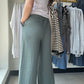 These Ash Jade Woven Wide Leg Pants are a stylish and comfortable addition to any wardrobe. Made with high quality woven crepe fabric, they feature an elastic band waist and drawstring waistband for a perfect fit. The side pockets add convenience and functionality to these cropped pants. Perfect for any casual or dressy occasion!