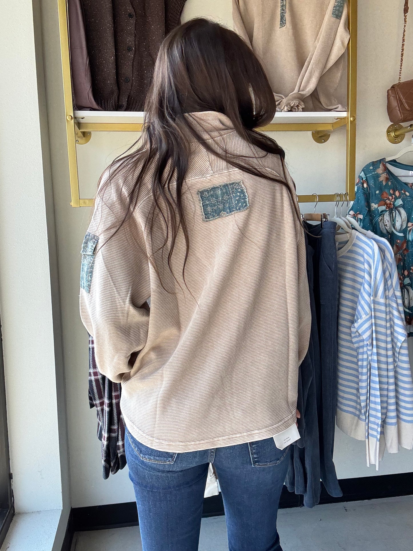 Embrace cozy vibes with the Khaki Denim Accent Pullover, featuring a mineral-washed finish for that perfectly lived-in look. This oversized, relaxed-fit pullover delights with contrast floral trim and a playful partial button-up front. Dropped shoulders and a collared neckline add casual charm, while a button-flap patch pocket on the sleeve adds a quirky touch. Perfect for layering or lounging in style!

