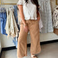 Comfort that actually looks good. The Latte Mineral Wash Drawstring Pants bring a relaxed, wide-leg silhouette to your wardrobe in the most wearable way — that warm latte hue with a mineral wash finish gives them a lived-in, effortlessly cool look that pairs with everything.

A stretchy smocked waistband with drawstring means you can go from couch to coffee shop without a second thought. Emphasized side seams and a curved hem add just enough structure to keep the wide-leg shape looking intentional, while si